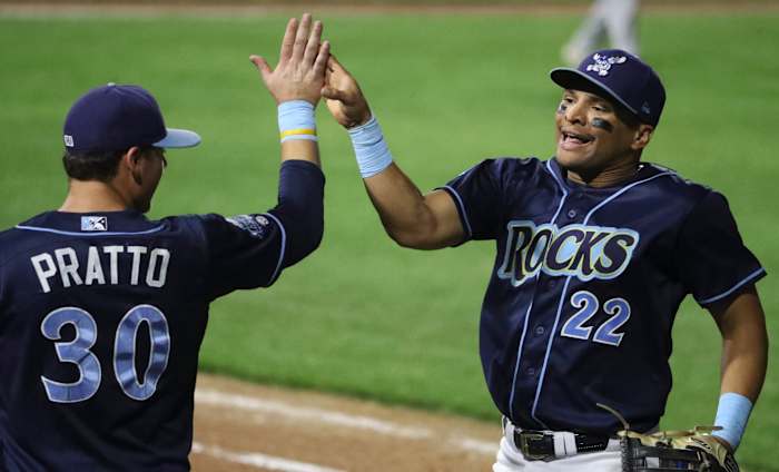 Wilmington's Tyler Hill is greeted by Nick Pratto after Hill made a running catch on a deep drive in the eighth inning of the Blue Rocks' 5-4 win in the second game of the Mils Cup Championship Series Wednesday at Frawley Stadium. Bluerocks 5 Fayetteville 4